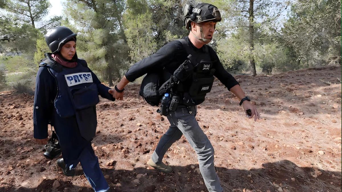 Israeli settlers attack journalists, villagers during West Bank olive harvest