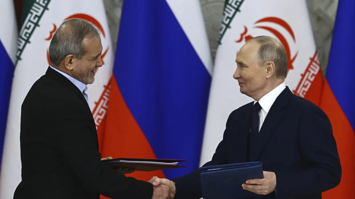 Putin meets Iran's top security official as Trump steps up pressure on Tehran
